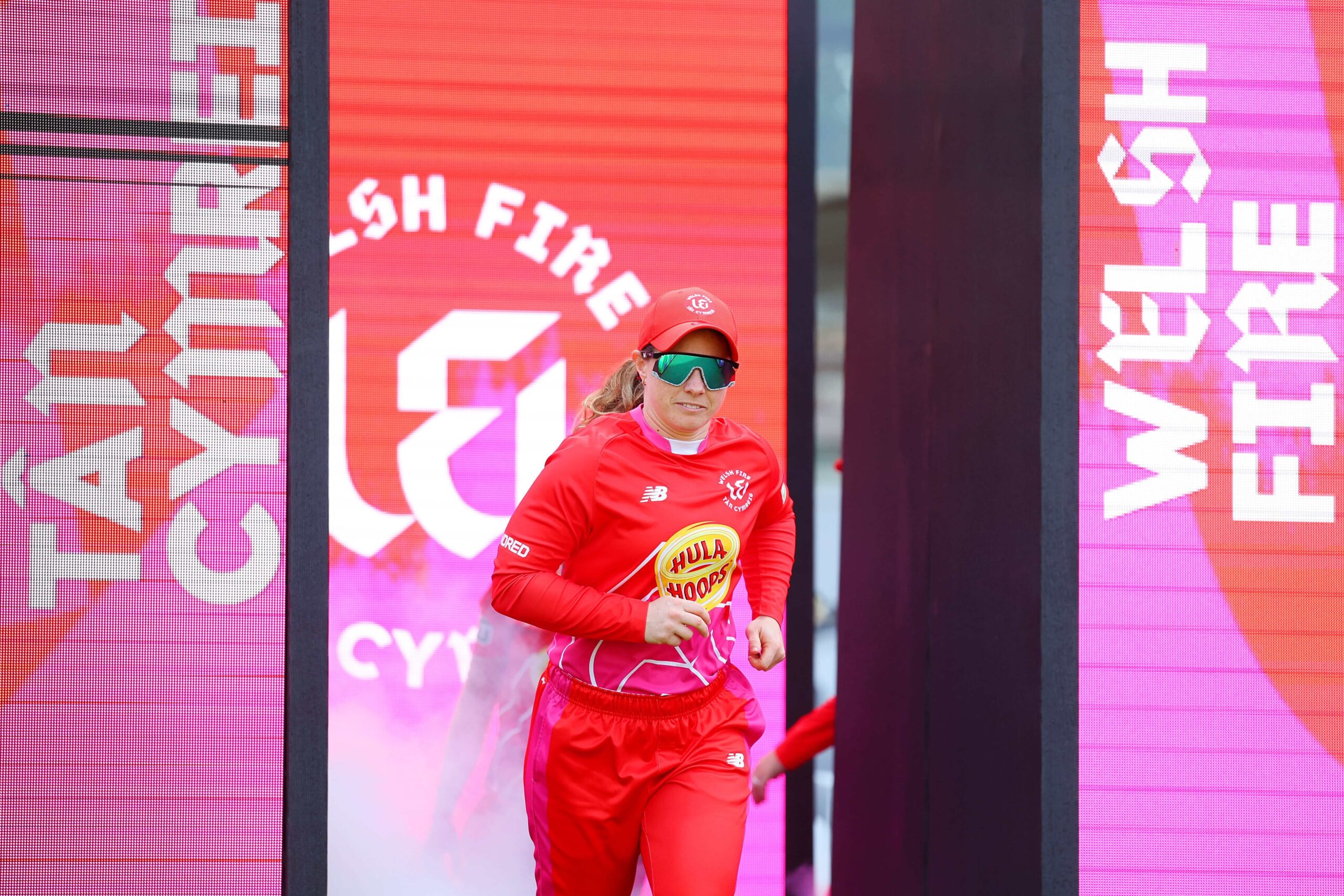 Welsh Fire team member Tammy Beaumont running on to pitch
